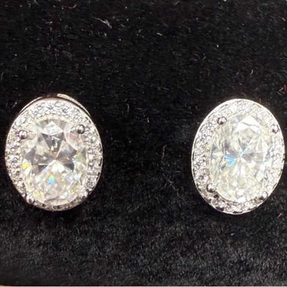 Two ct. Moissanite Oval earrings set in sterling silver $270 with GRA & COA NEW